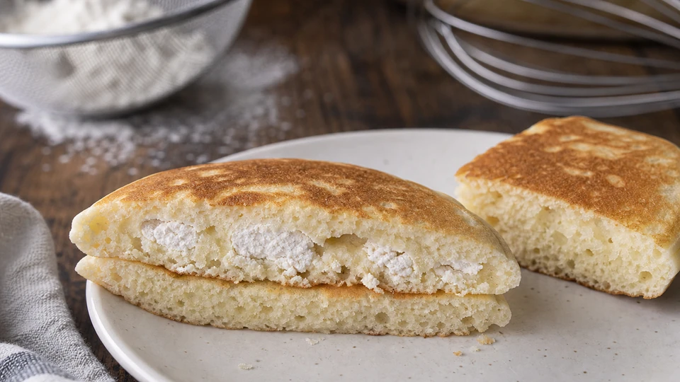 Editorial setup illustrating why pancakes taste floury after cooking.