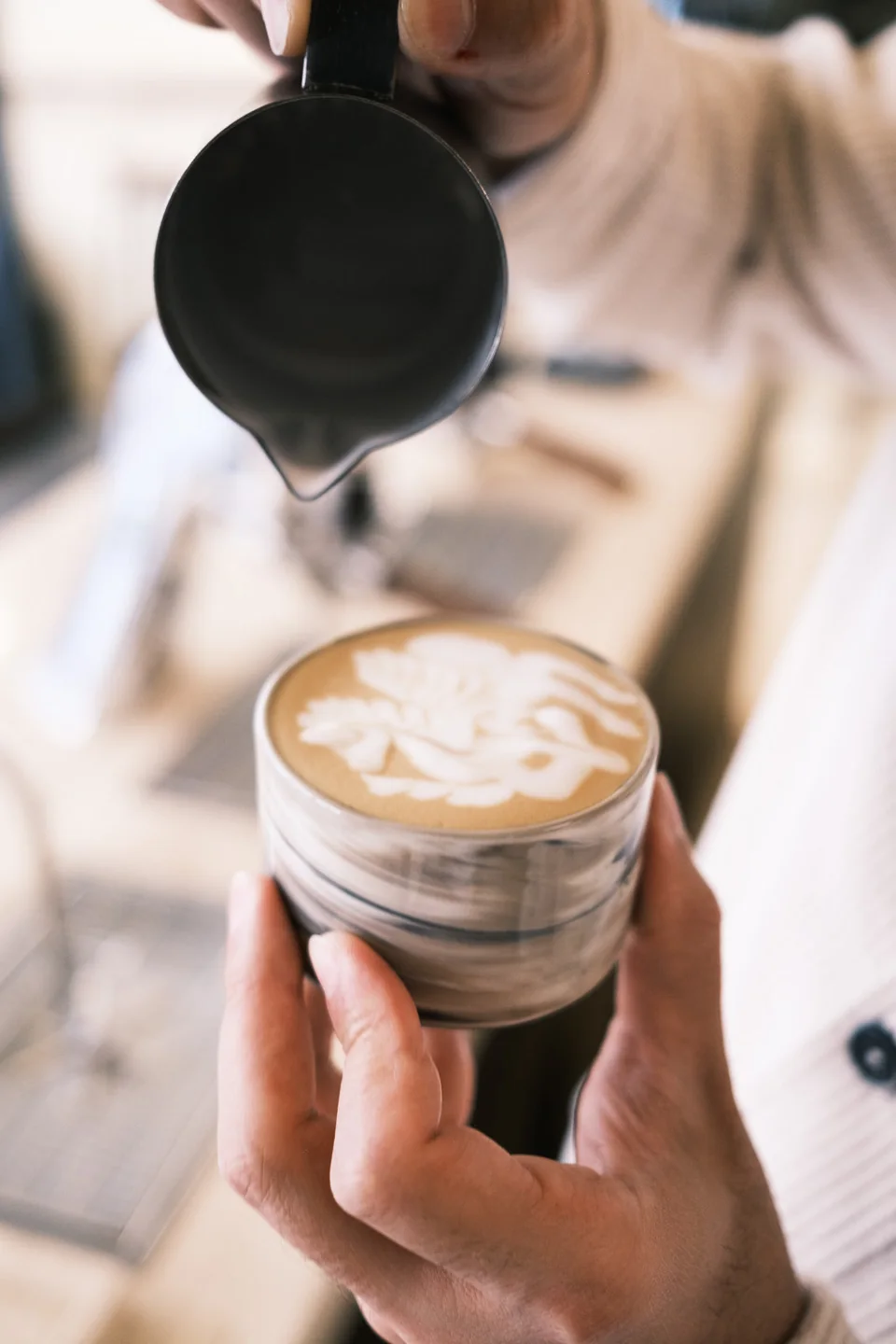 A finished latte in a handmade cup at Kanso Coffee Lab